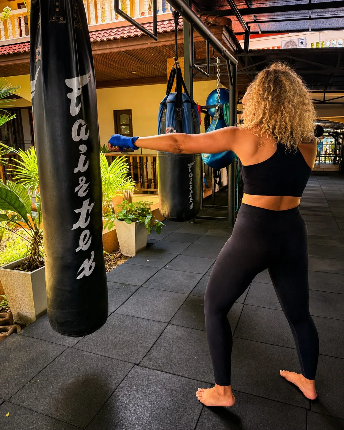 Guest training on the Muay Thai bags at Phuket Cleanse